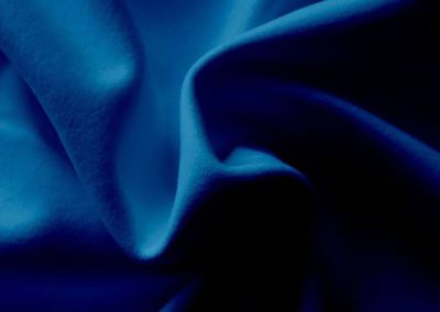 navy blue pipe and drape fabric