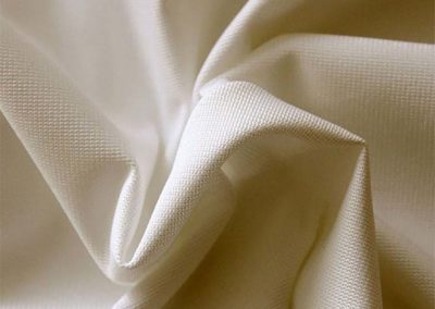 beige pipe and drape fabric