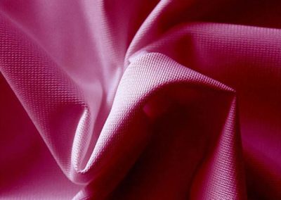 burgundy pipe and drape fabric